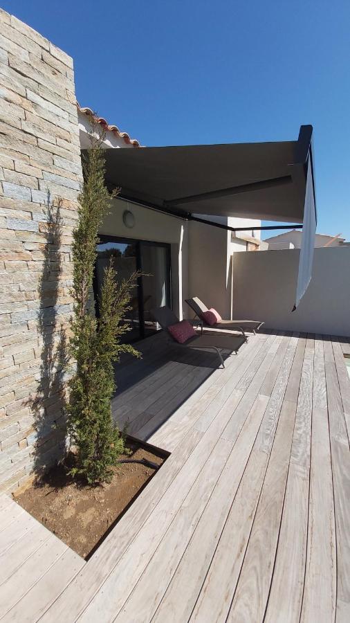 Villa HOME HOLIDAY à Cala Rossa Lecci Exterior foto