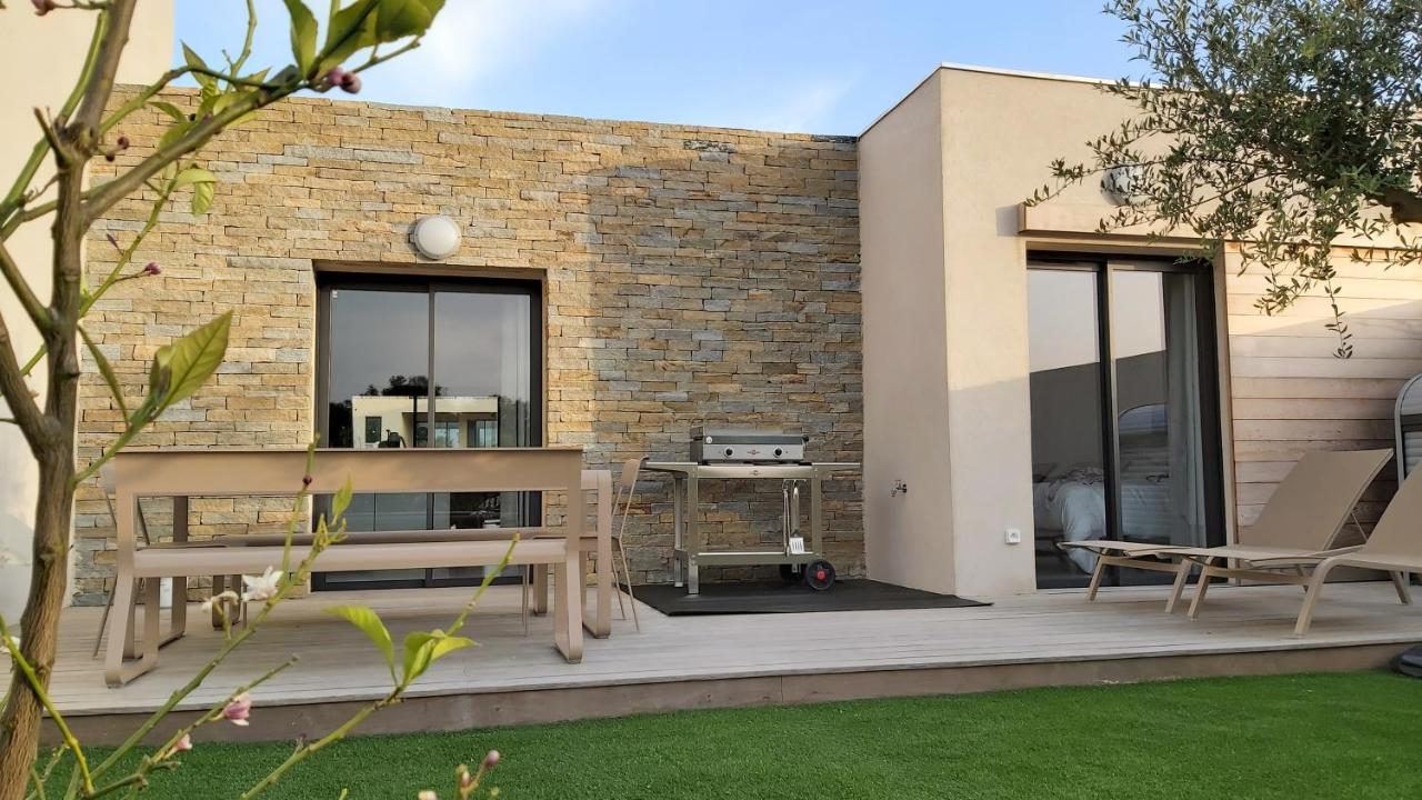 Villa HOME HOLIDAY à Cala Rossa Lecci Exterior foto