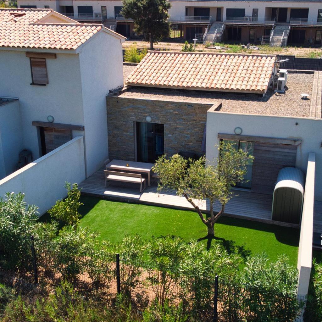 Villa HOME HOLIDAY à Cala Rossa Lecci Exterior foto