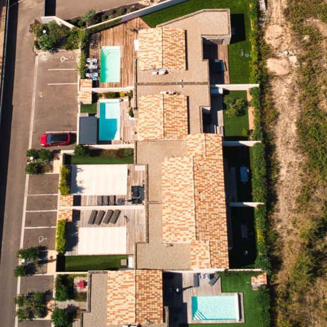 Villa HOME HOLIDAY à Cala Rossa Lecci Exterior foto